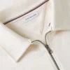 Camisola polo com fecho de correr de um quarto e logótipo floral Camisola polo com fecho de correr de um quarto e logótipo floral