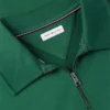 Camisola polo com fecho de correr de um quarto e logótipo floral Camisola polo com fecho de correr de um quarto e logótipo floral