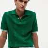 Camisola polo de malha trançada de manga curta Camisola polo de malha trançada de manga curta