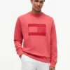 Camisola Raglan com logótipo da bandeira e interior escovado Camisola Raglan com logótipo da bandeira e interior escovado