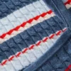 Camisola sem mangas com riscas em malha trançada Camisola sem mangas com riscas em malha trançada