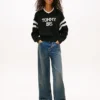 Camisola Tommy Jeans 85 Varsity com decote em V Camisola Tommy Jeans 85 Varsity com decote em V