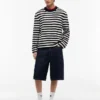 Camisola Tommy Jeans com riscas em bouclé Camisola Tommy Jeans com riscas em bouclé