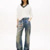 Camisola Tommy Jeans de corte descontraído com decote em V Camisola Tommy Jeans de corte descontraído com decote em V