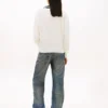 Camisola Tommy Jeans de corte descontraído com decote em V Camisola Tommy Jeans de corte descontraído com decote em V