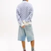 Casaco de malha xadrez Tommy Jeans com corte descontraído Casaco de malha xadrez Tommy Jeans com corte descontraído