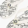 Chinelo com detalhes metálicos e estampa TH Script Chinelo com detalhes metálicos e estampa TH Script