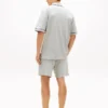 Conjunto de camisa de manga curta e calções Conjunto de camisa de manga curta e calções