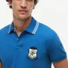 Corte regular Polo em piqué com emblema Monogram Corte regular Polo em piqué com emblema Monogram