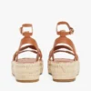 Espadrilha de plataforma com tiras torcidas em couro Espadrilha de plataforma com tiras torcidas em couro