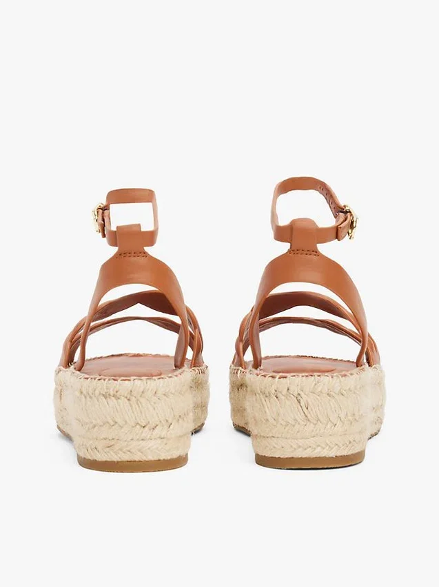 Espadrilha de plataforma com tiras torcidas em couro Espadrilha de plataforma com tiras torcidas em couro