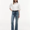 Jeans bootcut elásticos de cintura média Jeans bootcut elásticos de cintura média