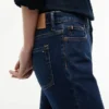 Jeans bootcut elásticos de cintura média Jeans bootcut elásticos de cintura média