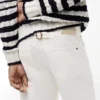 Jeans de corte largo tingidos na peça Jeans de corte largo tingidos na peça