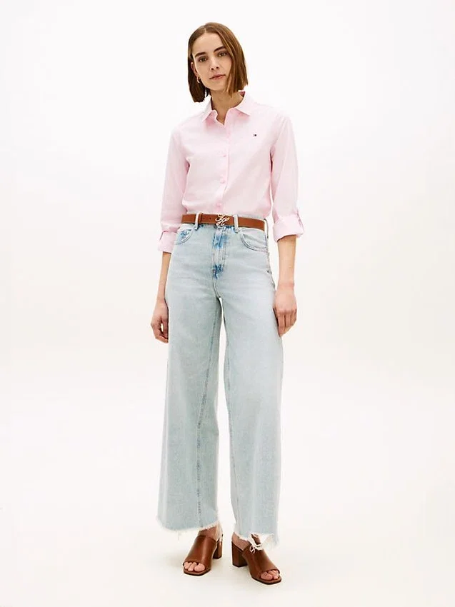 Jeans de ganga de cintura alta e perna larga com bainha crua Jeans de ganga de cintura alta e perna larga com bainha crua
