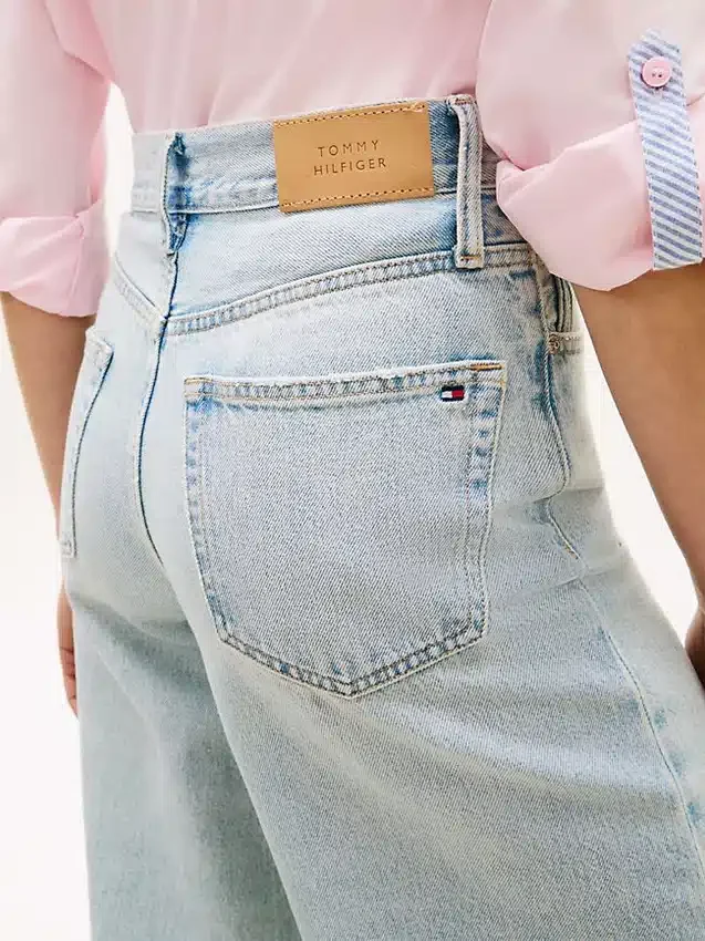 Jeans de ganga de cintura alta e perna larga com bainha crua Jeans de ganga de cintura alta e perna larga com bainha crua