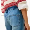 Jeans elásticos de corte largo para criança