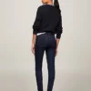 Jeans justos de cintura média com lavagem escura Jeans justos de cintura média com lavagem escura
