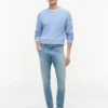 Jeans justos desbotados Jeans justos desbotados