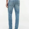 Jeans justos desbotados Jeans justos desbotados