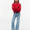Jeans largos com bolsos de remendo para criança Jeans largos com bolsos de remendo para criança