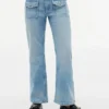Jeans largos com bolsos de remendo para criança Jeans largos com bolsos de remendo para criança