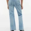 Jeans largos com bolsos de remendo para criança Jeans largos com bolsos de remendo para criança