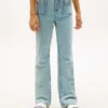 Jeans largos com bolsos de remendo para meninas