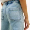 Jeans largos com bolsos de remendo para meninas