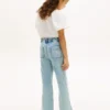 Jeans largos com bolsos de remendo para meninas
