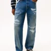 Jeans largos com efeito desgastado Jeans largos com efeito desgastado