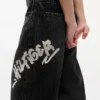 Jeans largos com estampado graffiti Hilfiger para criança