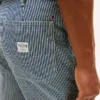 Jeans largos e retos com riscas ferroviárias Jeans largos e retos com riscas ferroviárias