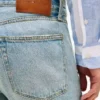 Jeans regulares e retos com efeito desgastado Jeans regulares e retos com efeito desgastado