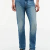 Jeans slim desbotados com elasticidade Jeans slim desbotados com elasticidade