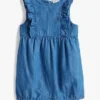 Macacão curto com folhos em chambray para bebés Macacão curto com folhos em chambray para bebés