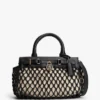 Mini-bolsa de couro com macramé Mini-bolsa de couro com macramé