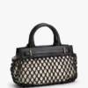 Mini-bolsa de couro com macramé Mini-bolsa de couro com macramé