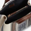 Mini-mala tipo satchel em jacquard às riscas Mini-mala tipo satchel em jacquard às riscas