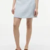 Mini-saia de tweed com botões dourados
