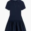 Mini-vestido polo de materiais mistos da Tommy Jeans Mini-vestido polo de materiais mistos da Tommy Jeans