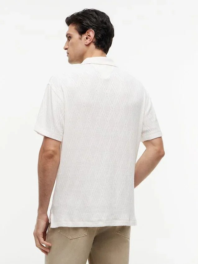 Polo clássico em jacquard texturado Polo clássico em jacquard texturado