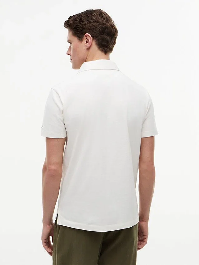 Polo com bolso em jersey de corte regular Polo com bolso em jersey de corte regular