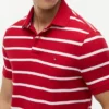 Polo com corte regular e riscas que absorve a humidade Polo com corte regular e riscas que absorve a humidade