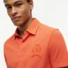 Polo com emblema tingido na peça, corte regular Polo com emblema tingido na peça, corte regular