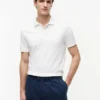 Polo com estampado de bandeiras em toda a peça Polo com estampado de bandeiras em toda a peça
