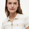 Polo com fecho e riscas de râguebi, corte justo Polo com fecho e riscas de râguebi, corte justo