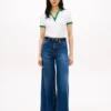 Polo com logótipo bordado em letra cursiva e corte regular Polo com logótipo bordado em letra cursiva e corte regular