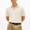 Polo com palmeira bordada e corte clássico Polo com palmeira bordada e corte clássico
