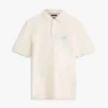Polo com palmeira bordada e corte clássico Polo com palmeira bordada e corte clássico